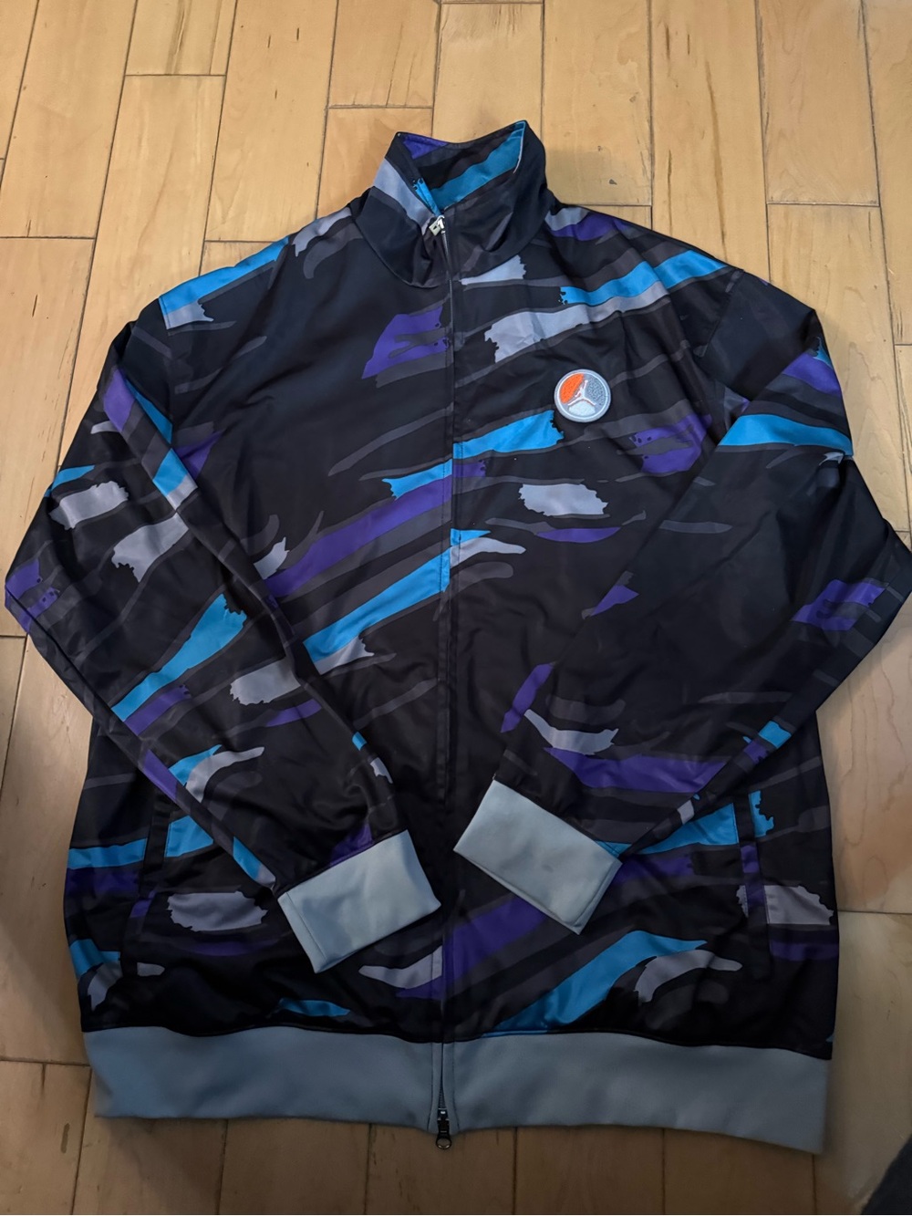 Jordan Black Windbreaker Jacket with Blue and Purple Accents